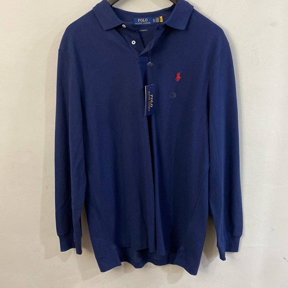 XL long sleeve polo shirt navy blue. Never worn still has tags